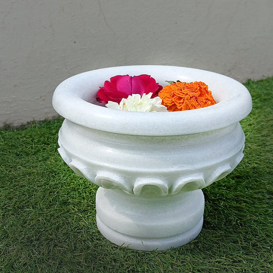 "Introducing Elegance in Every Curve: The Marble Round Planter Collection"